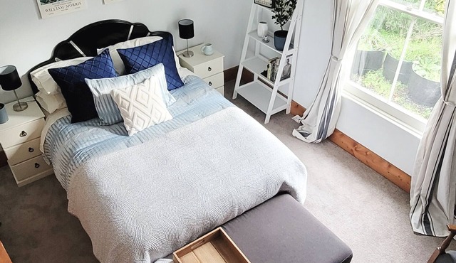 A charming 4-bedroom home! Just steps away from cozy cafes and local shops.