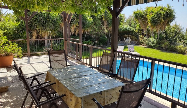 A charming villa set in beautiful gardens with sea & mountain views