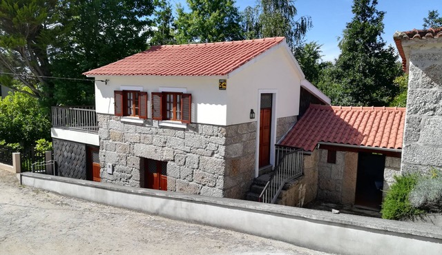 A cozy rustic house with essential services 25 meters away.