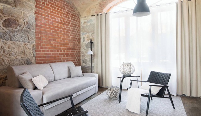 A designer studio beneath historic vaulted ceilings
