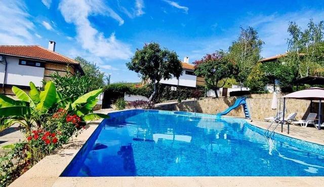 A dream vacation in a villa with a huge pool.