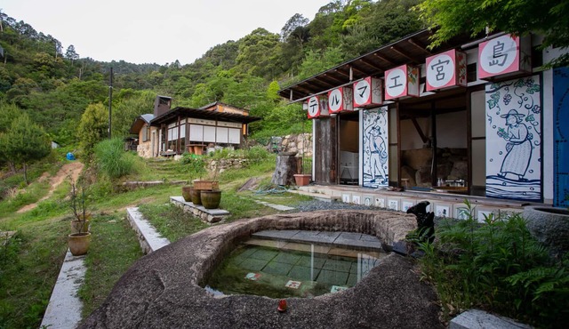 A farm surrounded by the primeval forest on the goddess island of Miyajima