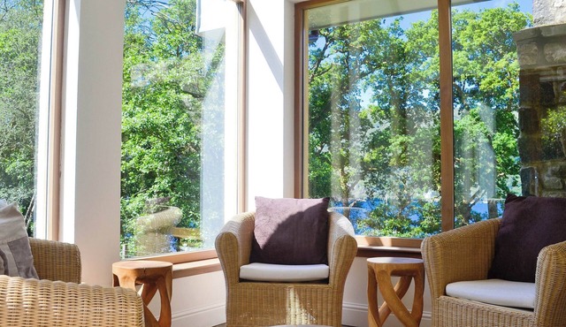 A large, detached property overlooking Loch Riddon on the Cowal Peninsula.