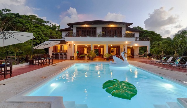A Luxury beachfront villa with semi-private sandy beach near famous Rincon Beach