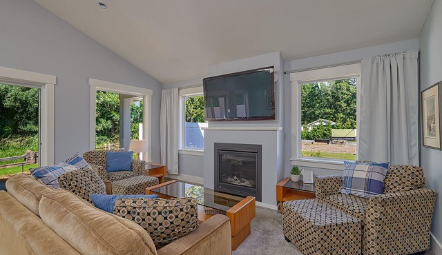 A modern cozy cottage in your own wooded backyard located mid Vancouver Island.