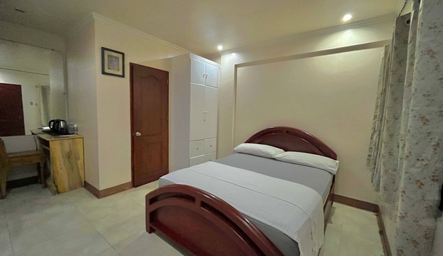 A peaceful beachfront resort with a home-like feel offering sea views.
