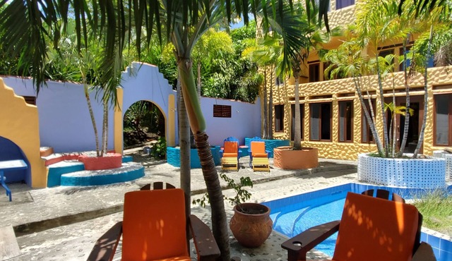 A Rustic Spanish, Adobe Style, Poolside Three Bedroom Villa