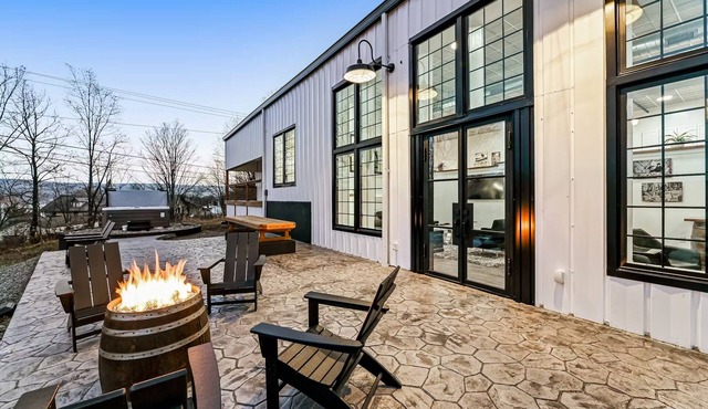 A showpiece, modern, lake-view marvel w/Hot Tub, Chef's Kitchen