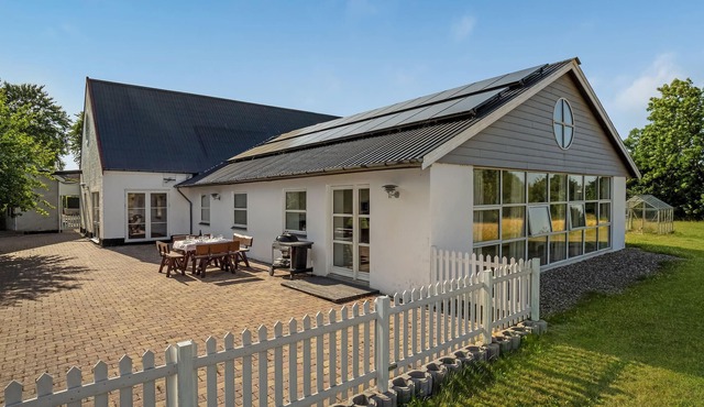 A spacious cottage surrounded by golden fields awaits you.
