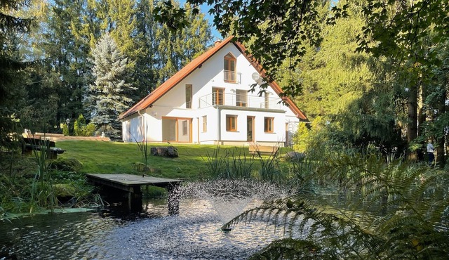 A spacious holiday home in the midst of beautiful nature with a large garden
