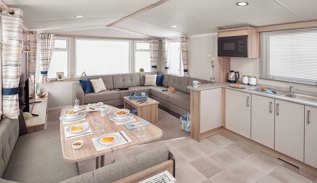 A spacious open plan holiday home with one master double and two twin bedrooms.