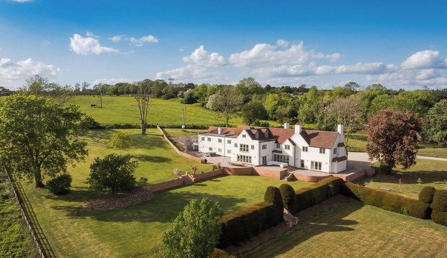 A stunning Edwardian-style country residence offering contemporary luxury in a tranquil village setting. Perfect for large groups, family gatherings, or multi-generational stays