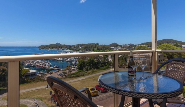 A top floor unit with panoramic views over the marina