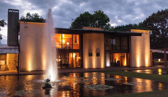 A villa designed by Tobia Scarpa, surrounded by nature.