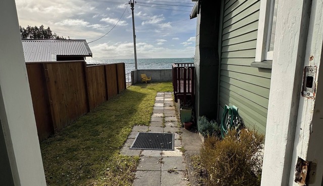 Absolute Beachfront Kiwi Bach