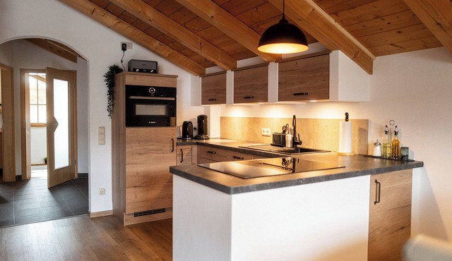 Achentaler Alpentor 54 m² for 2-4 persons, eat-in kitchen, bedroom, shower/WC, balcony, WLAN
