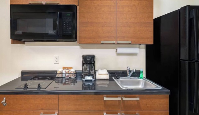Affordable Suites with Full Kitchens and On-Site Laundry