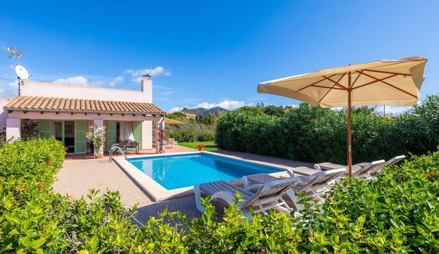 Air-Conditioned Holiday Home by the Sea with Pool, Garden, Terrace & Wi-Fi