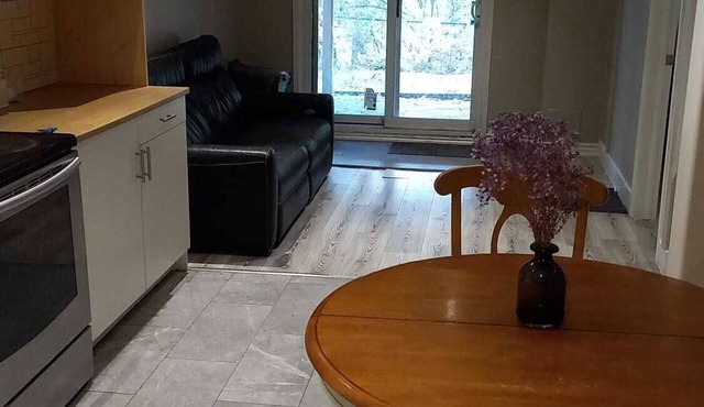 Airy, spacious, nature facing walk-out suite