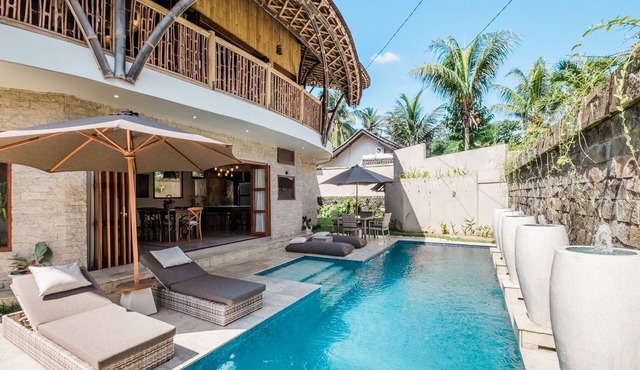 An eco-friendly villa with a tropical ambiance for relaxation and tranquility.