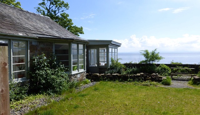 An idyllic seaside cottage right on the beach with stunning views. The most perfect position for a