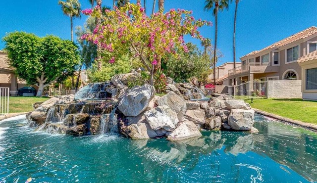 An Oasis with cascading waterfalls in your backyard