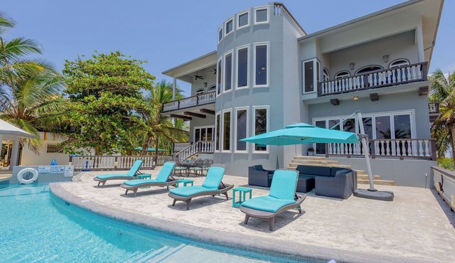 An unBELIZEable home.Barefoot beachfront luxury!