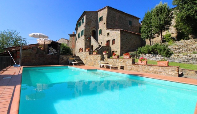 Ancient stone hamlet in an extremely panoramic position overlooking the wooded Val di Chio. Private