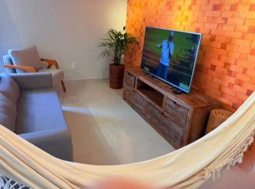 Apartamento com ar-condicionado, Wi-Fi no Campeche e estacionamento gratuito