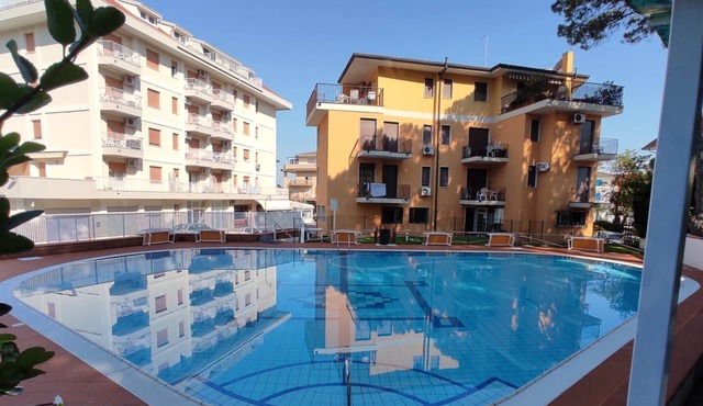 Apartment 5 people Condominio La Rustica with swimming pool WI-FI