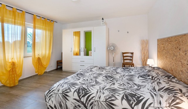 Apartment 'Bambù' with Private Garden, Balcony and Wi-Fi