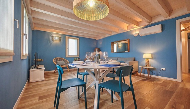 Apartment 'Ca' Marano Ocean' with Shared Pool, Wi-Fi and Air Conditioning