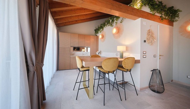Apartment 'Ca' Marano Lagoon' with Shared Pool, Wi-Fi and Air Conditioning