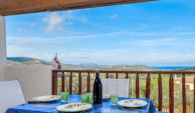 Apartment 'Con Vista Porto Taverna' with Sea View, Private Terrace and Air Conditioning