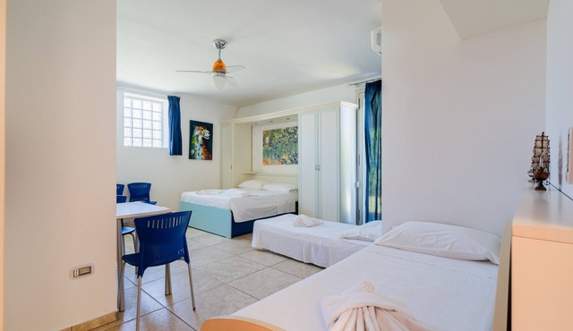 Apartment 'Core Resort - Familiare Bianca' with Shared Pool, Wi-Fi and Air Conditioning