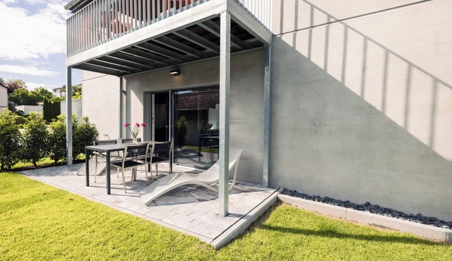 Apartment 'Ferienwohnung Gartenglück 75qm' with Private Terrace, Shared Garden and Wi-Fi