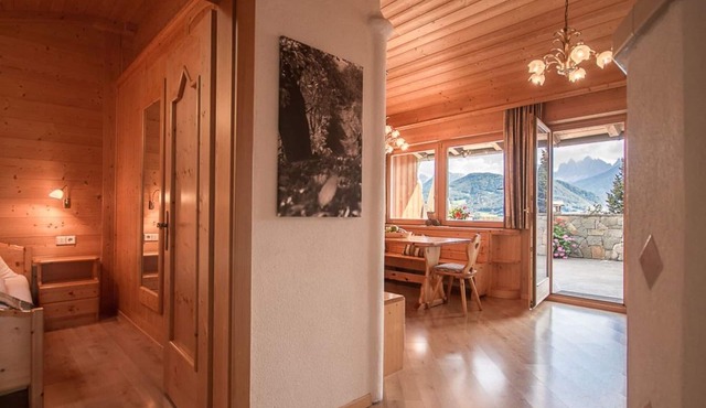 Apartment for 2-4 people with a large terrace and sauna as well as a tiled stove