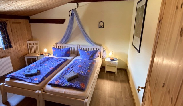 Apartment "Heuboden" cozy - wood-burning stove - great view of the countryside, sauna