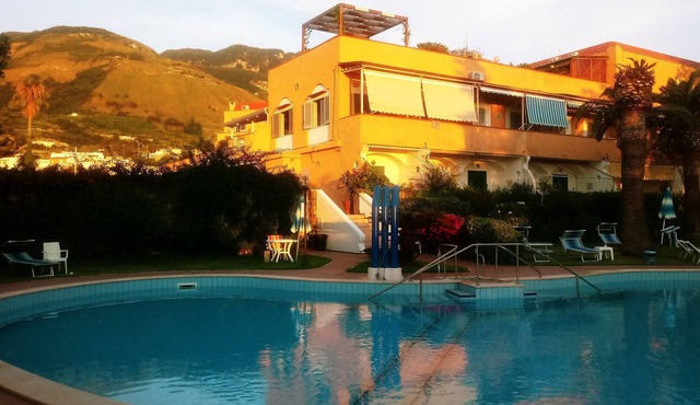Apartment in park with swimming pool near the sea.