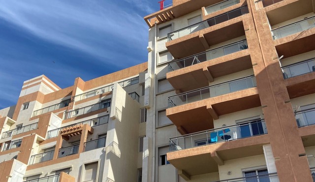 Apartment in secure residence with swimming pool, waterfront location