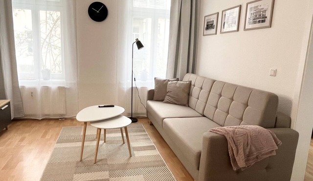 Apartment Mitten in der Stadt mit Garten und Grill
