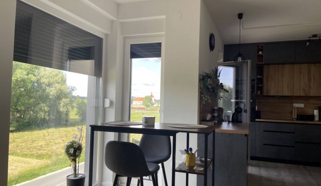 Apartment Nebo is a modern apartment with a view of the old town and mini zoo.