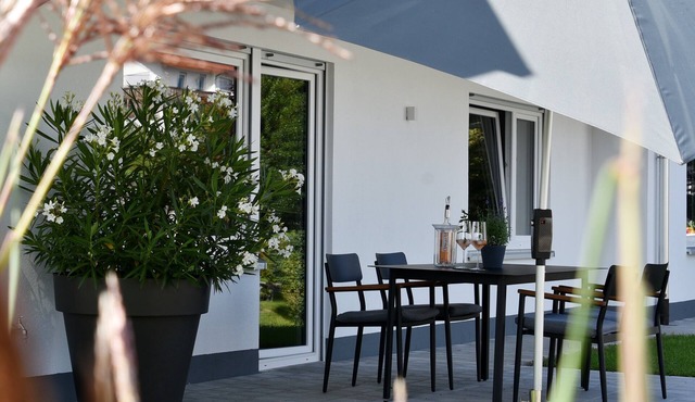 Apartment 'Quartier Wellant' with Terrace, Garden, and View of Weißensberg Chapel