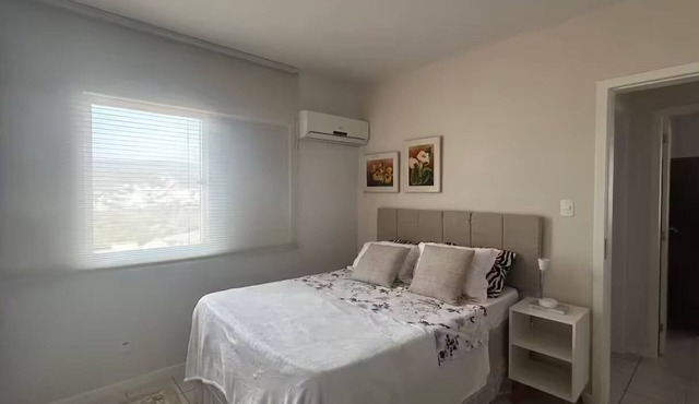 Apartment with 3 bedrooms, air conditioning, barbecue, and 3 parking spaces.