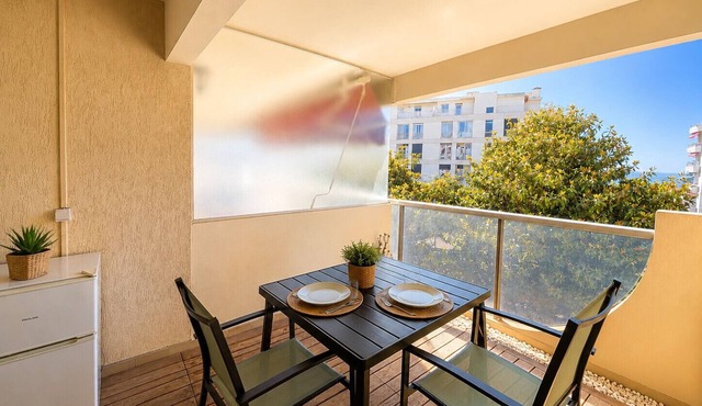 Apartment with balcony and pool near the sea