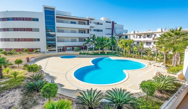 Apt. A Nice Home, with communal pool and close to the beach