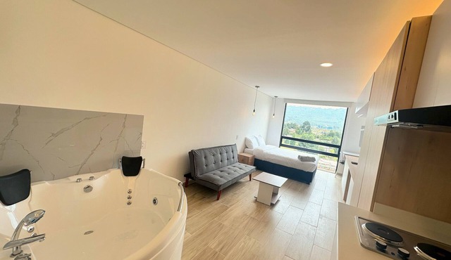 Apto con Jacuzzi Privado y vista verde