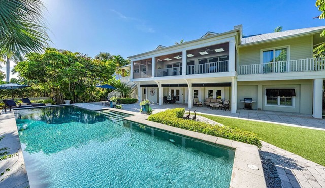 Aqualane Oasis | Waterfront Luxury Home Walkable to Beach & 3rd Street South