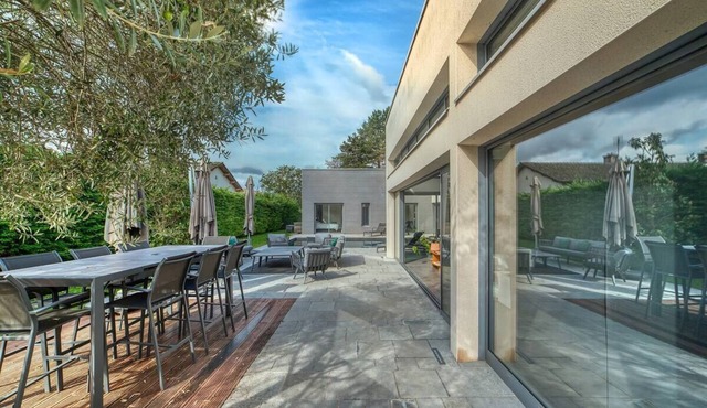 architect-designed house with pool