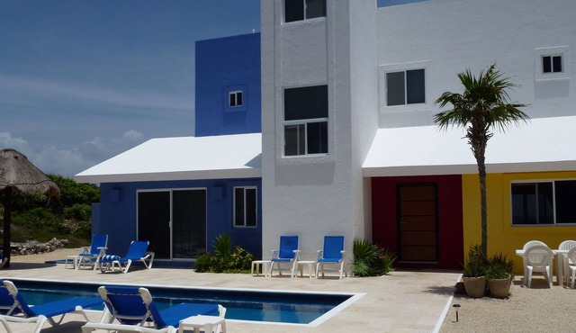 Architecturally Distinguished Colorful Casa on Water's Edge
